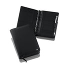 A black embossed cowhide compact organizer with a pen loop and zipper closure, displayed open and closed.